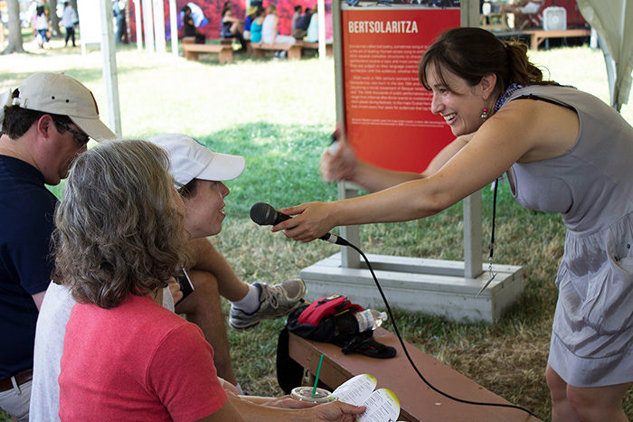 Errukine Olaziregi invites visitors to join the Basque dialogue. Photo by Brianna Allen, Ralph Rinzler Folklife Archives