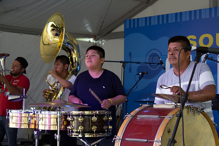 Banda Brillo de San Miguel Cuevas is part of the rich, dynamic soundtrack of California. Find them each day on the Sounds of California Stage & Plaza, accompanying the Grupo Nuu Yuku masked devil dancers. Photo by Brianna Allen, Ralph Rinzler Folklife Archives