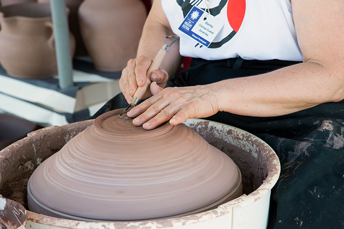 Blanka Gomez de Segura has been working away creating containers of all sizes in the pottery tent. Photo by Robert Friedman, Ralph Rinzler Folklife Archives