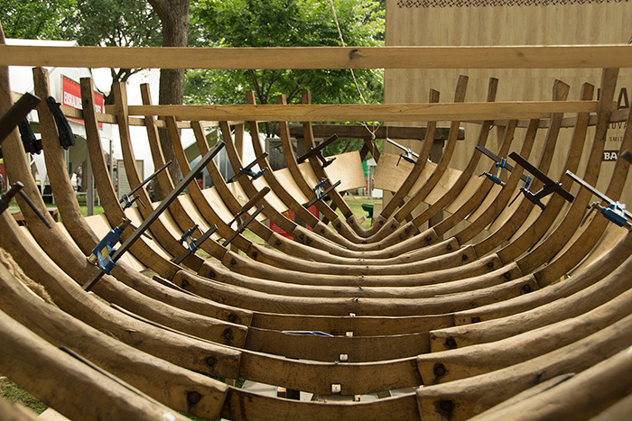 The Albaola <em>txalupa</em> is slowly taking shape as master shipbuilders craft pieces of the frame with wood from the Basque country. Photo by Gregory Gottlieb, Ralph Rinzler Folklife Archives