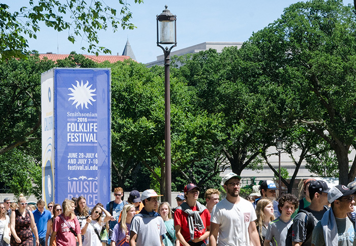 Visitors arrive at the Folklife Festival on July 2. Photo by Josh Weilepp, Ralph Rinzler Folklife Archives