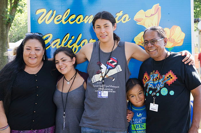 Generations of the Rodriguez family are here to represent the Kumeyaay community outside of San Diego and in Baja California with songs, stories, and games. Photo by Josh Weilepp, Ralph Rinzler Folklife Archives