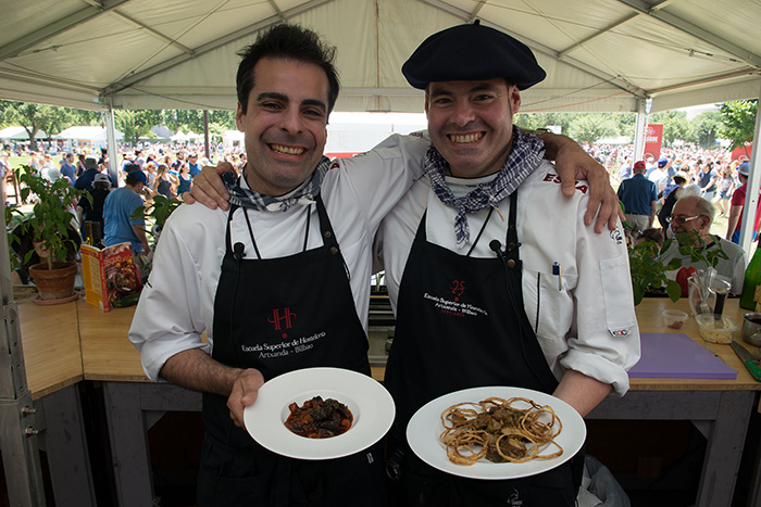 Basque chefs show off their completed dishes "From the Forest" in the Ostatua Kitchen. Photo by Walter Larrimore, Ralph Rinzler Folklife Archives