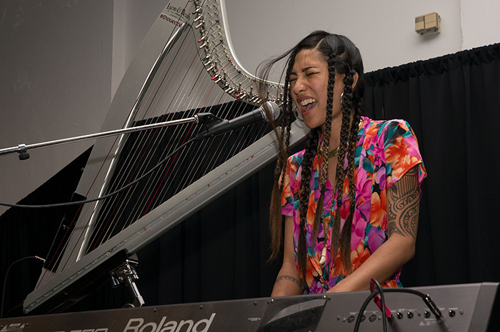 Providing a break from the heat and humidity, Low Leaf performed on the Arts and Industries Stage with her blend of harp, keys, and loops. Photo by Mark Young, Ralph Rinzler Folklife Archives