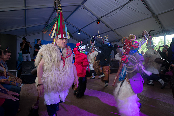 The Basque Joaldunak and the Californian Mixteco groups performed together for the first time today in the Sounds of California Stage & Plaza. Photo by Walter Larrimore, Ralph Rinzler Folklife Archives