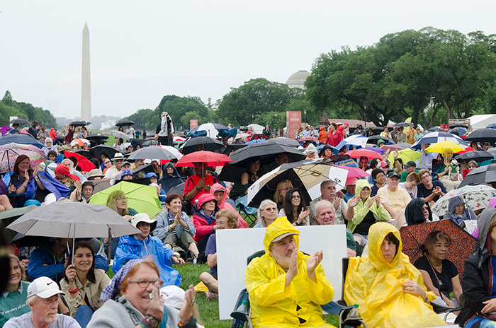 Despite a drizzly evening, a sea of umbrellas braved the rain to enjoy the Ralph Rinzler Memorial Concert honoring National Heritage Fellows. Thanks for sticking it out! Photo by Josh Weilepp, Ralph Rinzler Folklife Archives