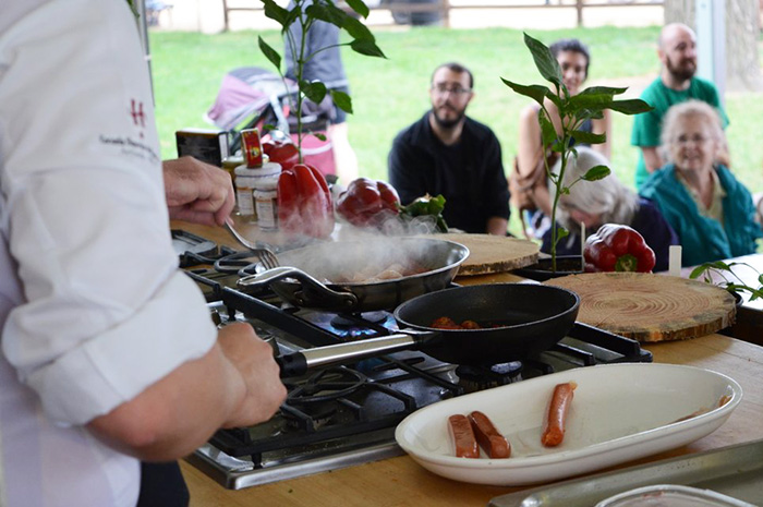 Chef Igor Ozamiz Goiriena cooks up sarteneko, or Basque skillet. Photo by Ravon Ruffin, Ralph Rinzler Folklife Archives