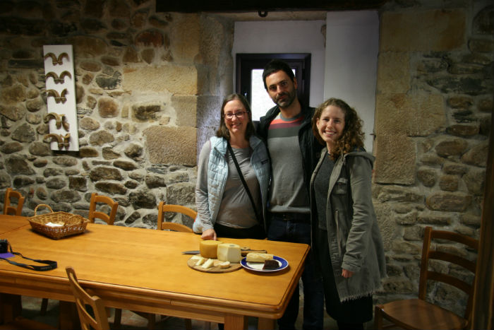 Smithsonian researchers Mary S. Linn and Anne Pedersen pose with Eneko Goiburu in his family's homestead. Ralph Rinzler Folklife Archives