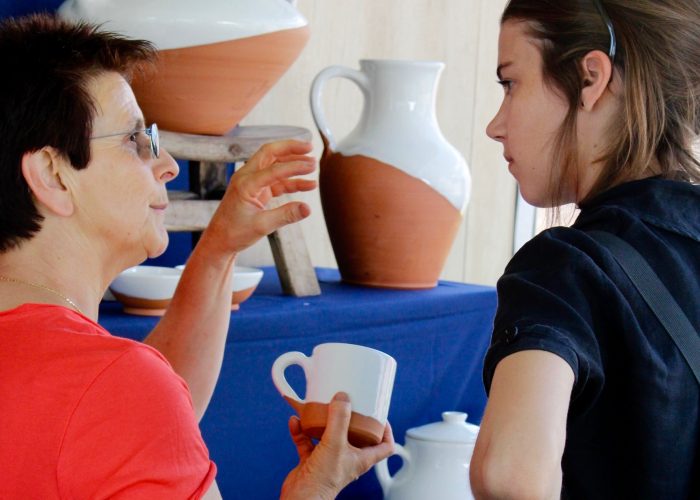 Blanka explaining an aspect of Basque pottery to Basque program intern Grace Caroll. Photo by SarahVictoria Rosemann