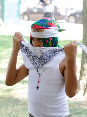 Noel Gil prepares for a performance with Grupo Nuu Yuku. Photo by Josh Weilepp, Ralph Rinzler Folklife Archives