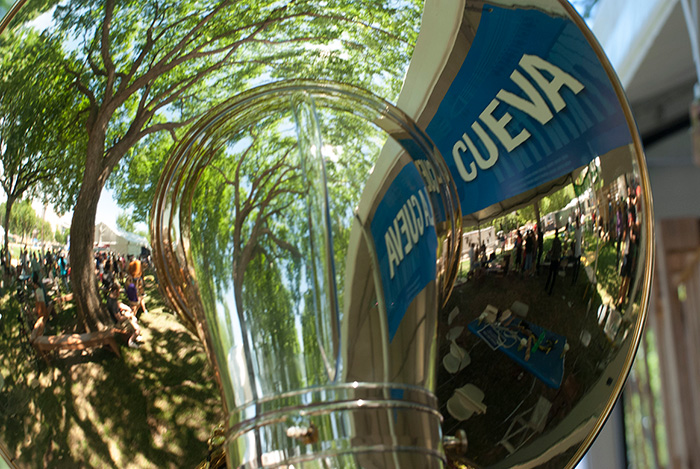 La Cueva reflected in the bell of Banda Brillo de San Miguel Cuevas' sousaphone. Photo by Ronald Villasante, Ralph Rinzler Folklife Archives