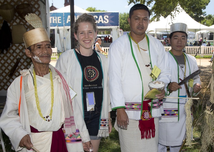 Anne Pedersen poses with Koro participants (L to R) Ramda Degio, Bhokta Newar, and Sange Mijew in the One World, Many Voices: Endangered Languages and Cultural Heritage program. Photo by Francisco X. Guerra, Ralph Rinzler Archives and Collections, Smithsonian Institution