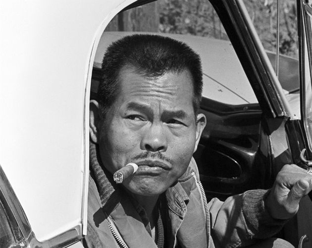 Larry Itliong arriving at a meeting of the Agricultural Workers Organizing Committee in the early 1960s. He is among the people profiled in Delano Manongs: Forgotten Heroes of the United Farmworkers Movement. ©1976 George Balis/Take Stock/The Image Works 