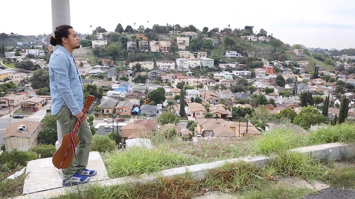 César Castro overlooks El Sereno, California. Still from video by Akira Boch