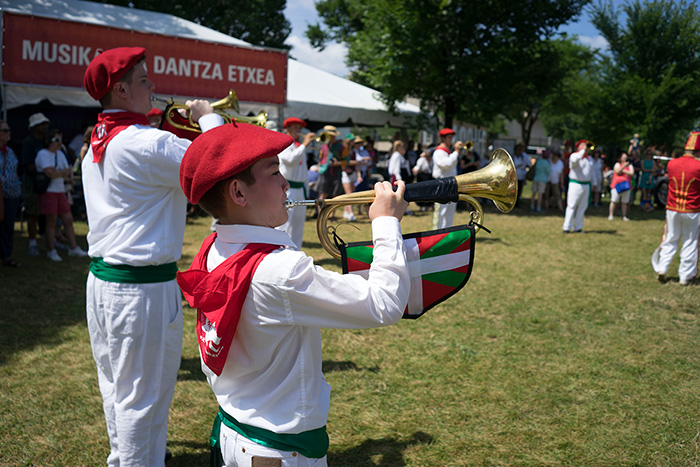 The Kern County Basque Club Klika trumpeted across the Festival grounds, carrying on the Basque drum and bugle corps tradition. Photo by Caroline Angelo, Ralph Rinzler Folklife Archives